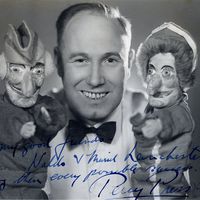 Percy Press I (1902-1980), Punch Professor, with <em>Punch and Judy</em>. Glove puppets. Photo courtesy of Collection: The National Puppetry Archive