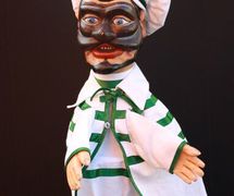 Brighella, a <em>burattino</em> (glove puppet) in the Bergamo tradition by puppeteer Pietro Roncelli (Brembate di Sopra, Bergamo, Italy). Photo courtesy of Bruno Ghislandi