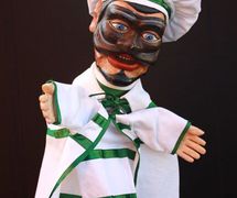 Brighella, a <em>burattino</em> (glove puppet) in the Bergamo tradition by puppeteer Pietro Roncelli (Brembate di Sopra, Bergamo, Italy). Photo courtesy of Bruno Ghislandi