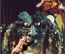 <em>Piggery Jokery</em> (1995) por Hand to Mouth Theatre (New Forest, Reino Unido), puesta en escena, concepción y fabricación de títeres: Martin Bridle y Su Eaton, titiritera en la foto: Su Eaton.Títere de guante. Foto: Joe Low