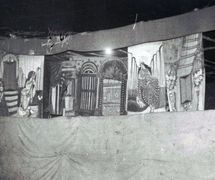 Stage and printed ba<em>c</em>kdrop for a traditional puppet show of West Bengal. Photo courtesy of Sampa Ghosh