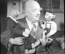 Josef Skupa (1892-1957), Czech puppeteer, visual artist, and author of plays for the puppet theatre, with his popular string puppet characters Spejbl and Hurvínek. Photo courtesy of Archive of Loutkář