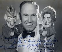 Per<em>c</em>y Press I (1902-1980), Pun<em>c</em>h Professor, with <em>Pun<em>c</em>h and Judy</em>. Glove puppets. Colle<em>c</em>tion: The National Puppetry Ar<em>c</em>hive