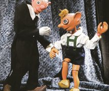Spejbl and Hurvínek, popular comic characters of the Czech puppet theatre created by Josef Skupa. String puppets made of wood and fabric (1920-1926), height: 60-80 cm, design: Karel Nosek (Spejbl), Gustav Nosek (Hurvínek). Photo courtesy of Archive of Loutkář