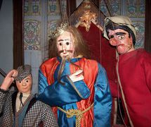 <em>La Passion</em> adaptation of Michel de Ghelderode and popular tradition, Théâtre Royal de Toone (Brussels, Belgium). Puppet characters (from left to right): Woltje, Juseke and Jef Patâât. Rod marionettes. Photo: Nicolas Géal