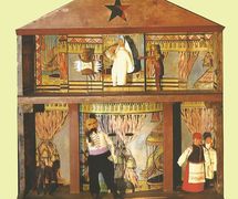 Boîte-théâtre en bois et marionnettes d'un vertep de style Kupyansky (1828, village de Bohodukhiv, Kupyansk, l’oblast de Kharkiv, l'est de l'Ukraine). Texte, mise en s<em>c</em>ène, <em>c</em>on<em>c</em>eption et <em>c</em>onstru<em>c</em>tion de marionnettes, manipulation : Ivan Knyshevsky. Marottes, en bois et en tissu (étage supérieur, de gau<em>c</em>he à droite) : deux Anges, Mort ; (plan<em>c</em>her inférieur, de gau<em>c</em>he à droite) : Chèvre, Cosaque, Vieille femme, Vieil homme (Baba, Did). Colle<em>c</em>tion : Musée d'Etat de Théâtre, Musique et Cinéma d'Ukraine (Kyiv)